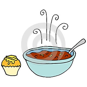 Bowl of chili and cornbread muffin