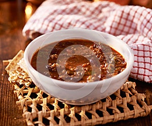 Bowl of chili shot with selective focus