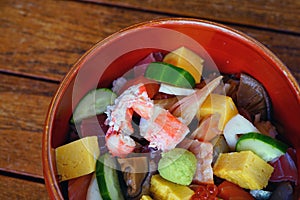 Bowl of chirashi sushi over rice