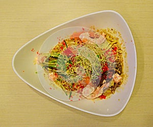 A bowl of cold Japanese pasta with fresh raw ingredients