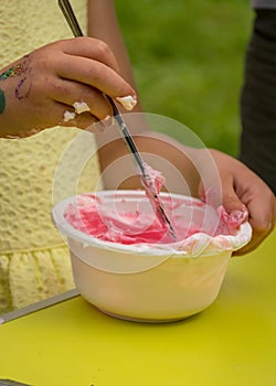 Bowl with a colorful slime, making a slime at a birthday party, children`s games - making a slime