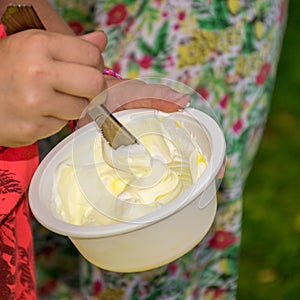 Bowl with a colorful slime, making a slime at a birthday party, children`s games - making a slime