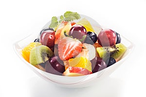 Bowl of colorful tropical fruit salad