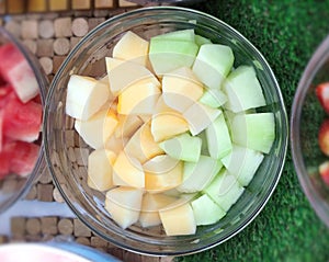 A bowl of combination fresh sliced Cantaloupes and Melons