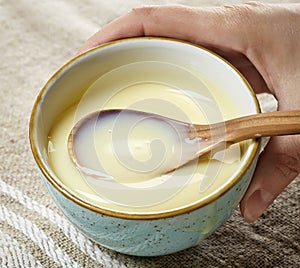 Bowl of condensed milk with sugar