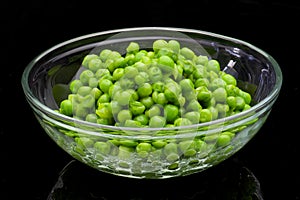 A bowl of cooked green peas