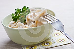 Bowl of cooked pelmeni