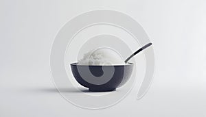 A bowl of cooked white rice, ready to eat