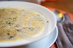 Bowl of cream soup with champignon mushrooms