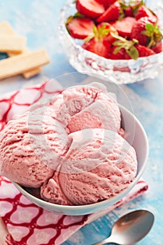 Bowl of creamy artisanal strawberry ice-cream