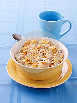 Bowl of crunchy corn flakes for breakfast