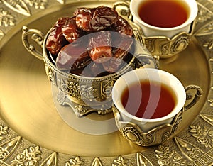 Bowl of dates and tea