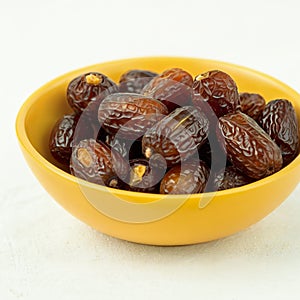 A bowl of dates, White Background,
