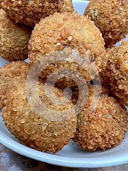 Bowl with delicious bitterballen up close in a restaurant.