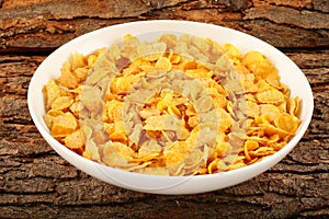 Bowl of delicious corn flakes with out milk.