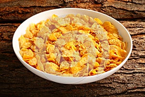 Bowl of delicious corn flakes with out milk.
