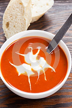 A bowl of delicious tomato soup with creme fraiche