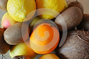 A bowl of different tropic fruits. Close up of healthy variety of food