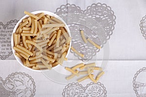 Bowl of dried macaroni pasta