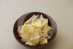 Bowl of Dried Pineapple for snack-bite