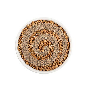 Bowl of Dry Buckwheat Grains Isolated on White Background Top View