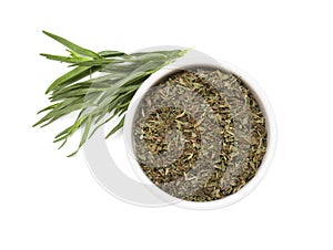 Bowl of dry tarragon and fresh leaves isolated on white, top view