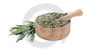 Bowl of dry tarragon, scoop and fresh leaves isolated on white