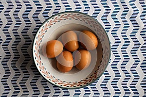 Bowl of eggs, five brown eggs in a bowl