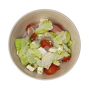 Bowl with fetta salad on a white background