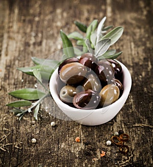 Bowl filled with black olives