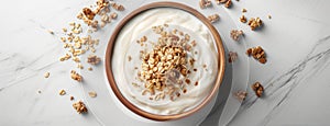 a bowl filled with Greek yogurt topped with granola, positioned centrally on a light background, with additional granola