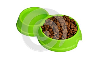 A bowl of food and water for a cat or dog on a white background