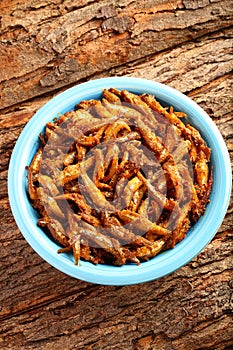 Bowl of fresh anchovy fish fry.