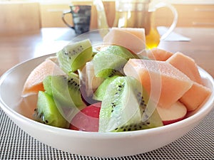 A bowl with fresh fruits - healthy nutrition concept