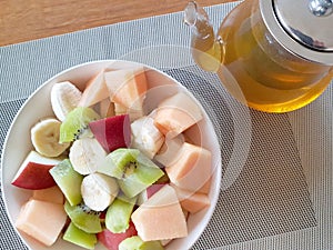 A bowl with fresh fruits - healthy nutrition concept