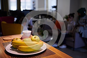 A bowl of fresh fruits at modern startup office