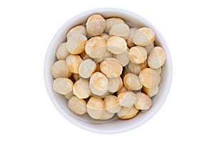 Bowl of fresh healthy shelled macadamia nuts