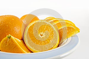 Bowl of fresh juicy oranges
