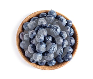 Bowl of fresh raw blueberries isolated on white, top