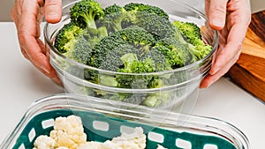 Bowl of fresh raw vegetables, cauliflower and broccoli