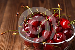 Bowl with fresh red Cherries.