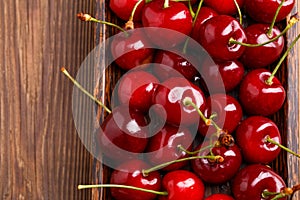 Bowl with fresh red Cherries.