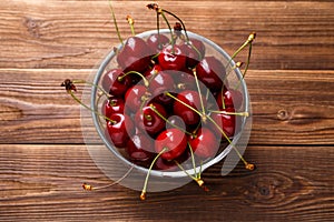 Bowl with fresh red Cherries.