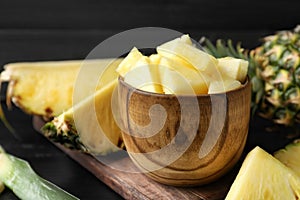Bowl with fresh sliced pineapple
