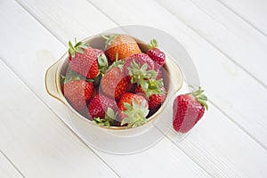 Bowl of Fresh strawberries on white