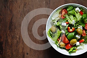 A bowl of freshly made greek salad with organic ingredients