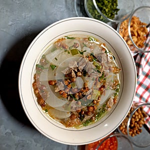 A bowl of freshly prepared vegetable soup (Soto Bandung), an ideal meal for healthy eating and wellbeing.