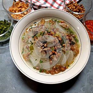 A bowl of freshly prepared vegetable soup (Soto Bandung), an ideal meal for healthy eating and wellbeing.