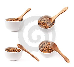 Bowl full of almond seeds isolated