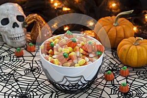 Bowl full of candy corn in a Halloween theme